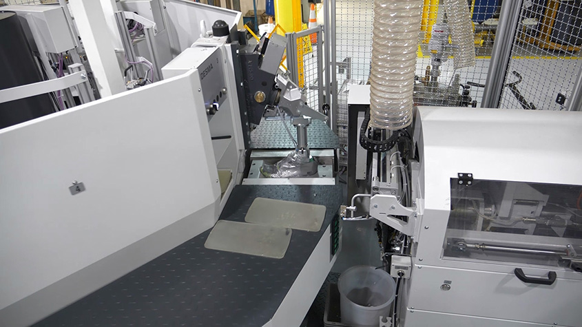 A DESMA injection machine in the Footwear Development Center in Wyandotte, Michigan / Eine DESMA-Spritzgieà maschine im Footwear Development Center in Wyandotte, Michigan